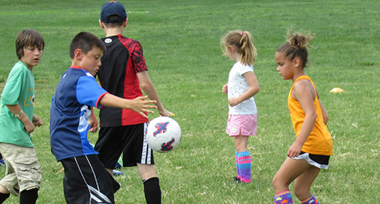 Kids playing soccer
